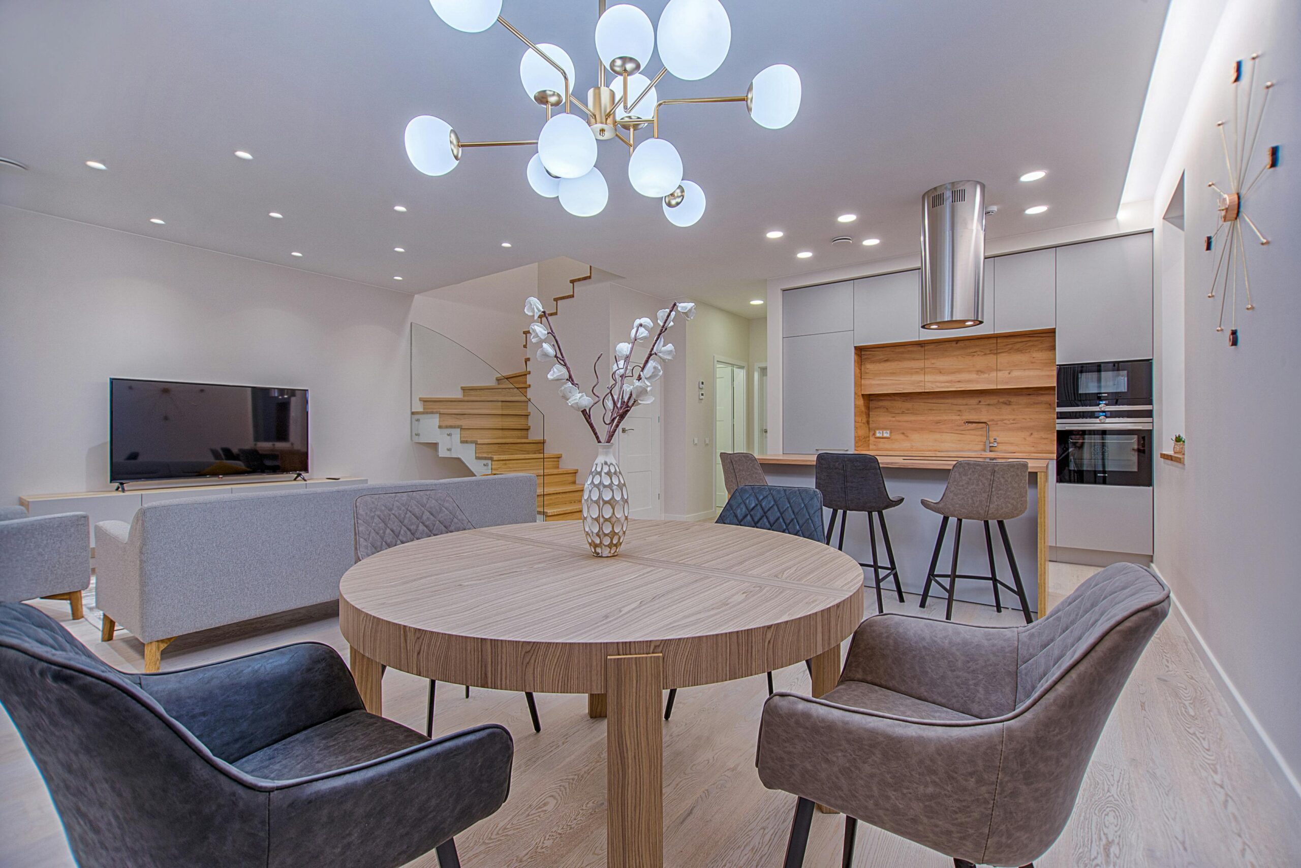 A picture of a living room with tasteful furniture